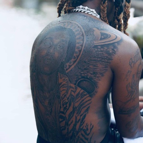 Offset honours Takeoff with massive back tattoo