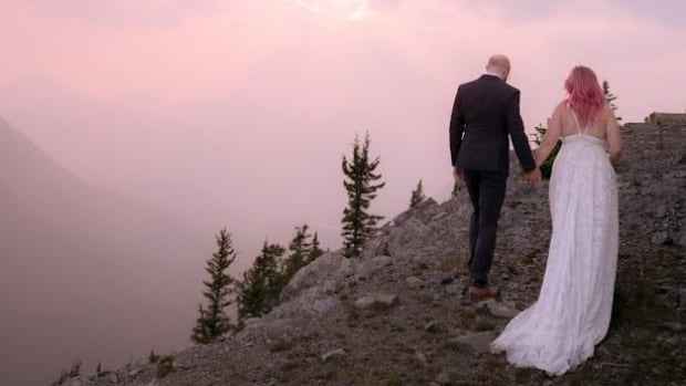 Newlyweds spend their wedding night at the top of broken down Banff Gondola