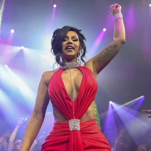 Cardi B throws microphone at fan who tossed drink at her