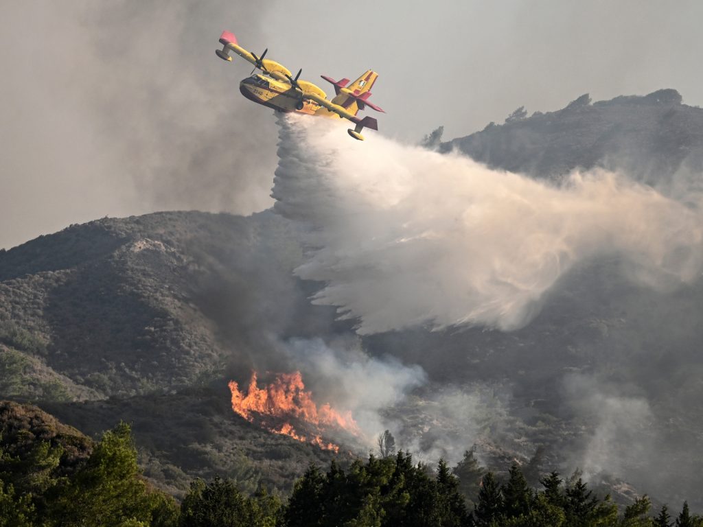 Firefighting plane crashes in Greece as wildfires rage