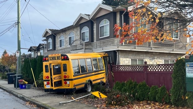 11 people taken to hospital after school bus crashed into home in Burnaby, B.C., paramedics say