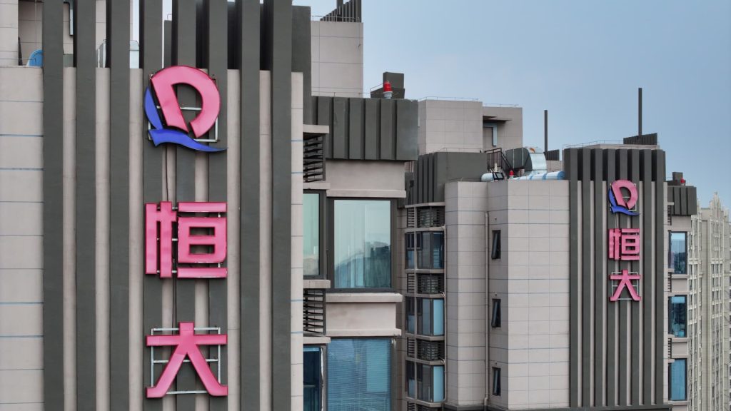 Evergrande shares rise as court hearing to wind up property firm is postponed again