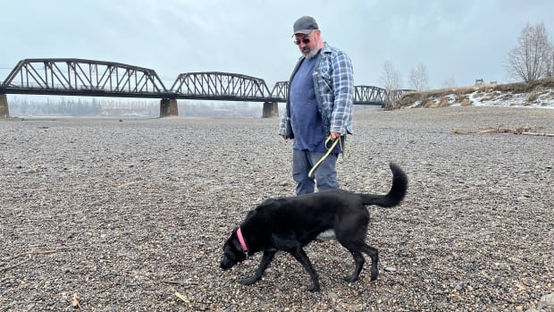 Residents stroll riverbed in Prince George, B.C., amid unprecedented drought