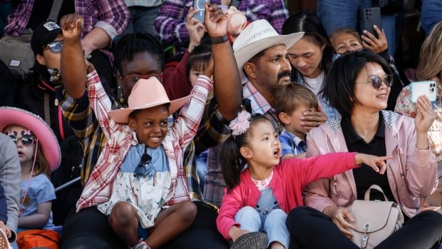 Large parade crowd helps kick off first day of the Calgary Stampede