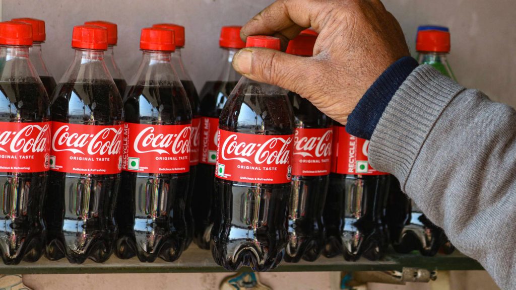 Coca-Cola says it will sell more soda in plastic bottles if aluminum tariffs take effect